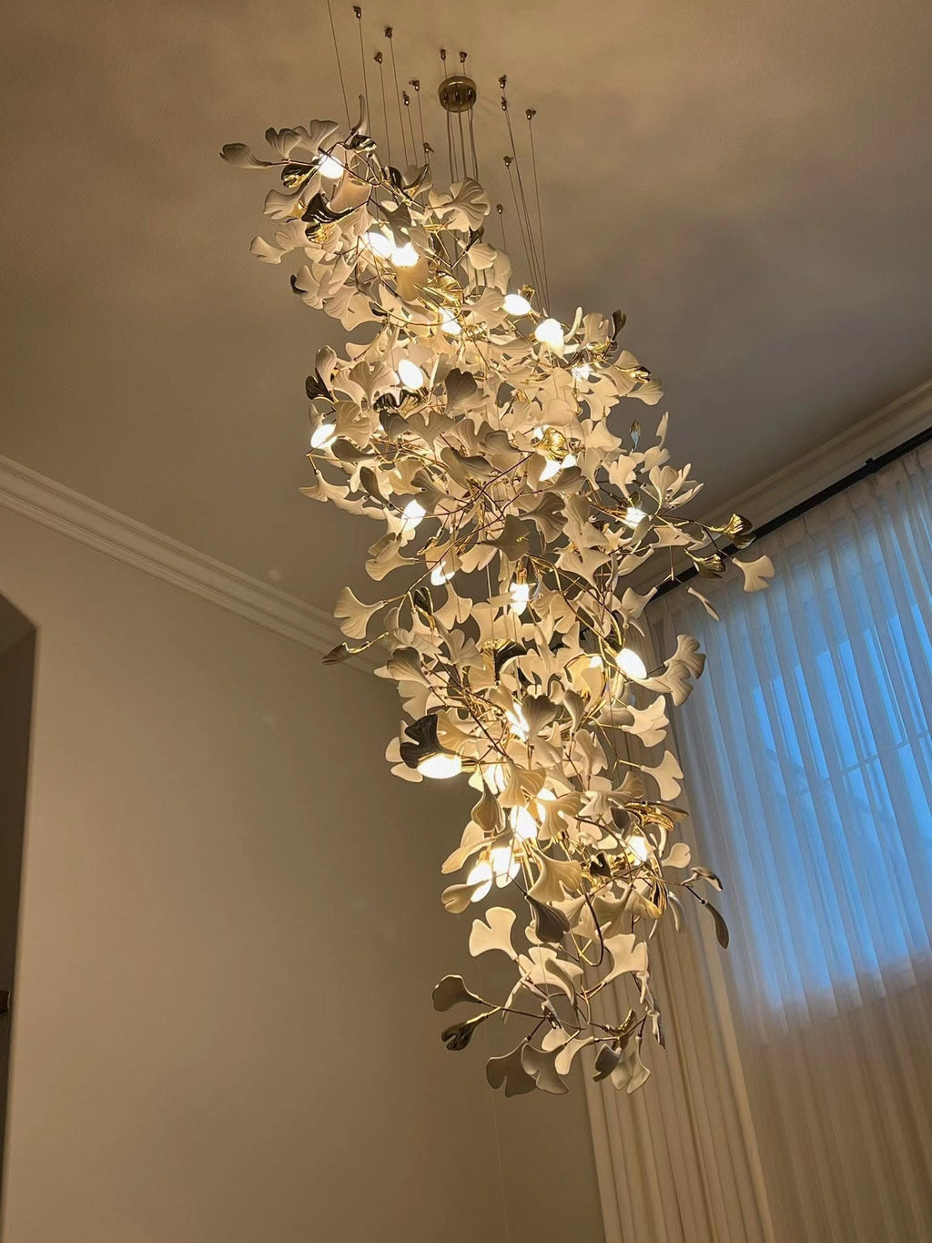 Artistic Tree Branch Pendant Light with Ceramic Ginkgo Leaves for High Ceilings in Hotel or Home - Riviko