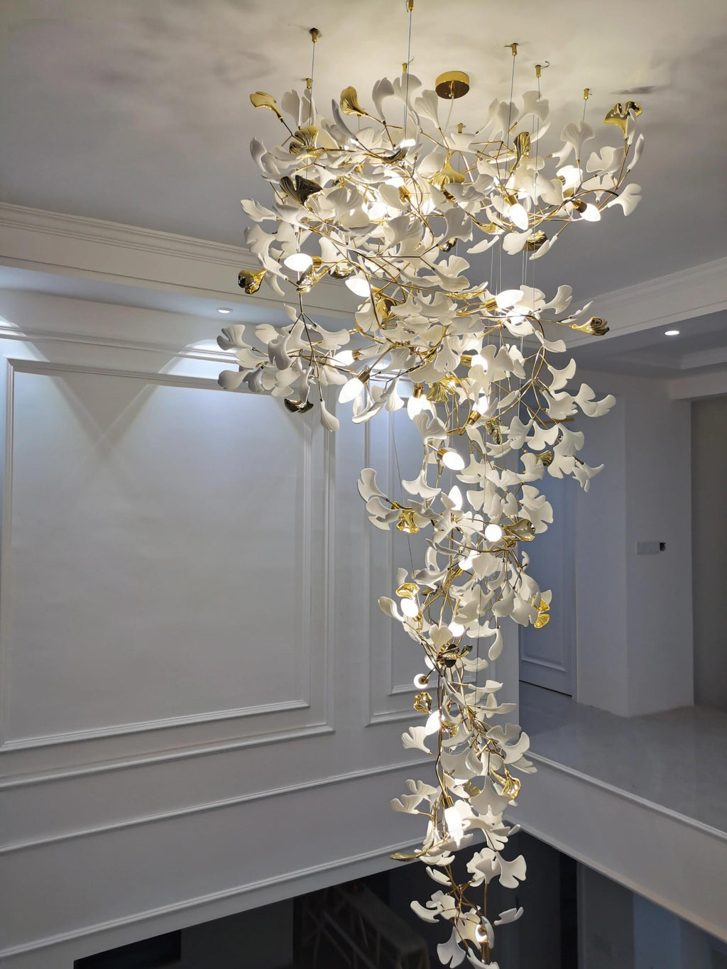 Artistic Tree Branch Pendant Light with Ceramic Ginkgo Leaves for High Ceilings in Hotel or Home - Riviko