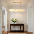 Riviko Aura Oval Chandelier with Rod, Dining Room Chandelier 47"x9" - elegant American entryway with arched doorway