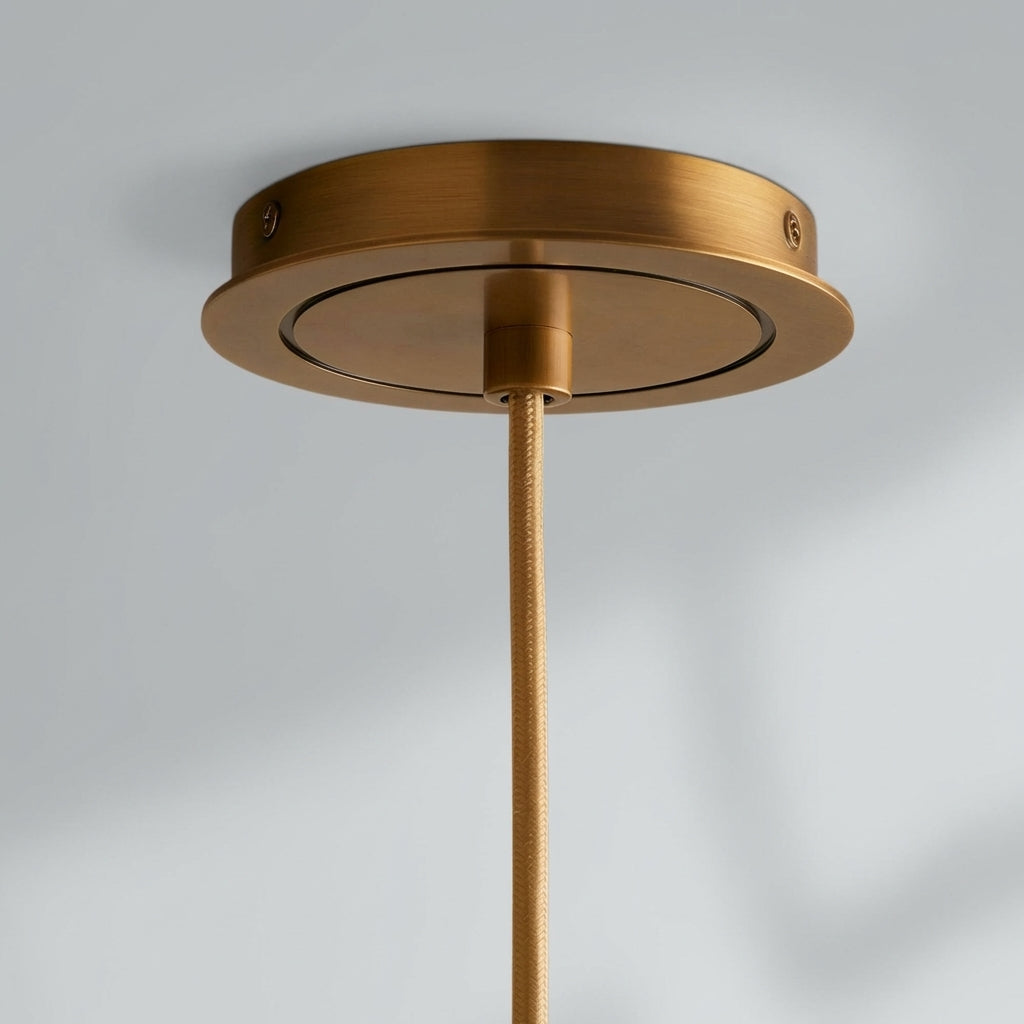 Riviko Radiant Ribbed Brass Pendant Lamp - Studio Shot