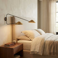 Riviko Veridian Dual-Arm Wall Sconce - elegant American bedroom