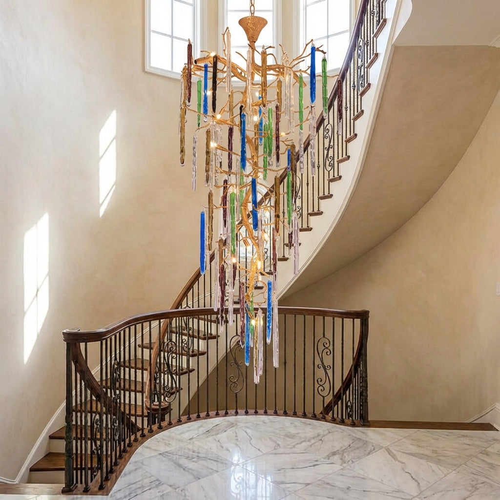 Riviko Verdant Canopy Brass Branch Chandelier - dramatic American stairwell with soaring ceiling