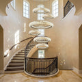 Riviko Celestial Rings Multi-Layer Crystal Chandelier - dramatic American stairwell with soaring ceiling