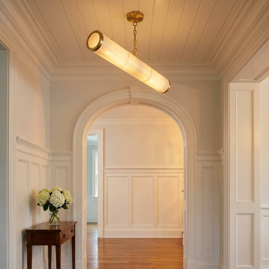 Riviko Alden Linear Alabaster Chandelier - elegant American entryway with arched doorway