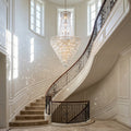 Riviko Luxury Modern Multi-tiered Crystal Chandelier for Staircase/Foyer - dramatic American stairwell with soaring ceiling
