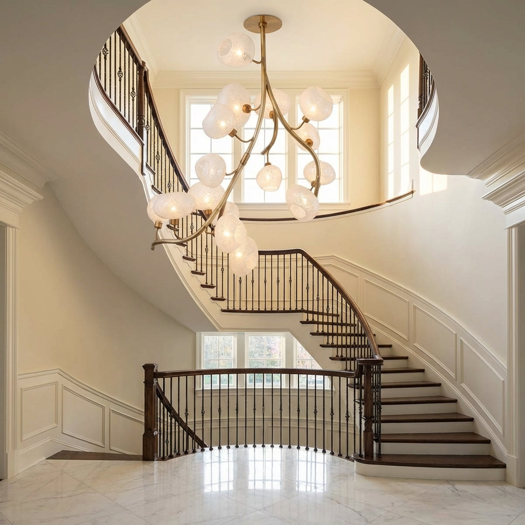 Riviko Verdant Branch Brass Chandelier with Irregular Glass Shades - dramatic American stairwell with soaring ceiling