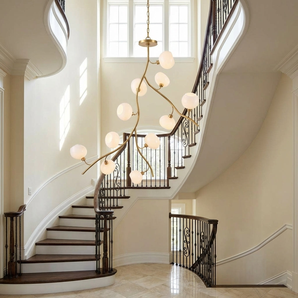 Riviko Veridian Branch Brass Chandelier with Artisan Glass - dramatic American stairwell with soaring ceiling