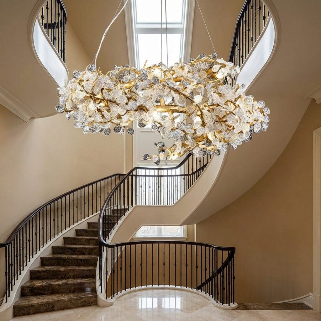 Riviko Verdant Canopy Brass Chandelier - dramatic American stairwell with soaring ceiling