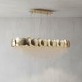 Riviko Radiant Oval Brass Crystal Chandelier - Background Shot