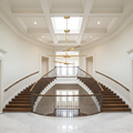 Riviko Pulsara Chandelier - dramatic American stairwell with three-story void
