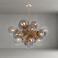Riviko Radiant Orb Brass Smoked Glass Chandelier - Background Shot