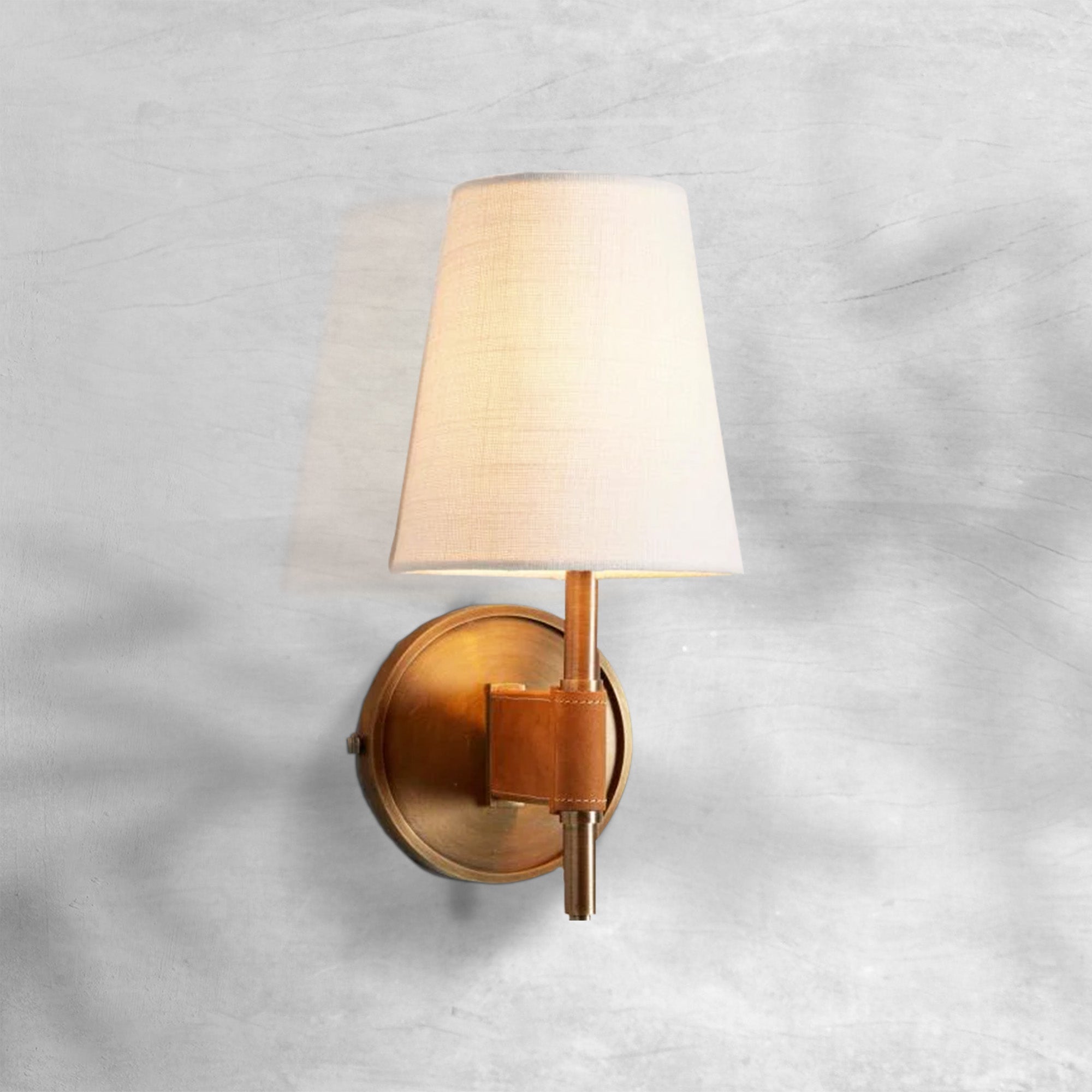 Riviko Heritage Brass & Leather Wall Sconce - Background Shot