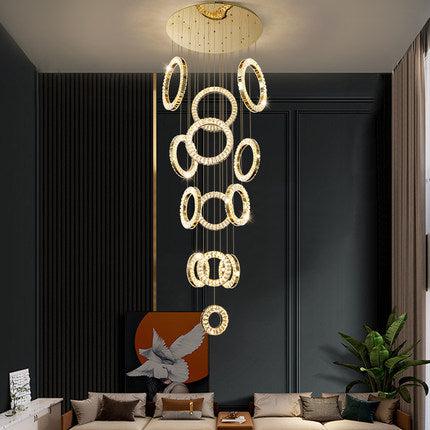 Riviko Aura Grandeur Multi-Ring Round Chandelier - American transitional great room with cathedral ceiling