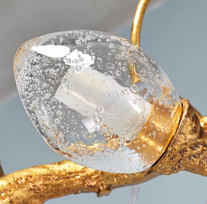Riviko Veridian Branch LED Chandelier with Clear Seedy Glass - Background Shot