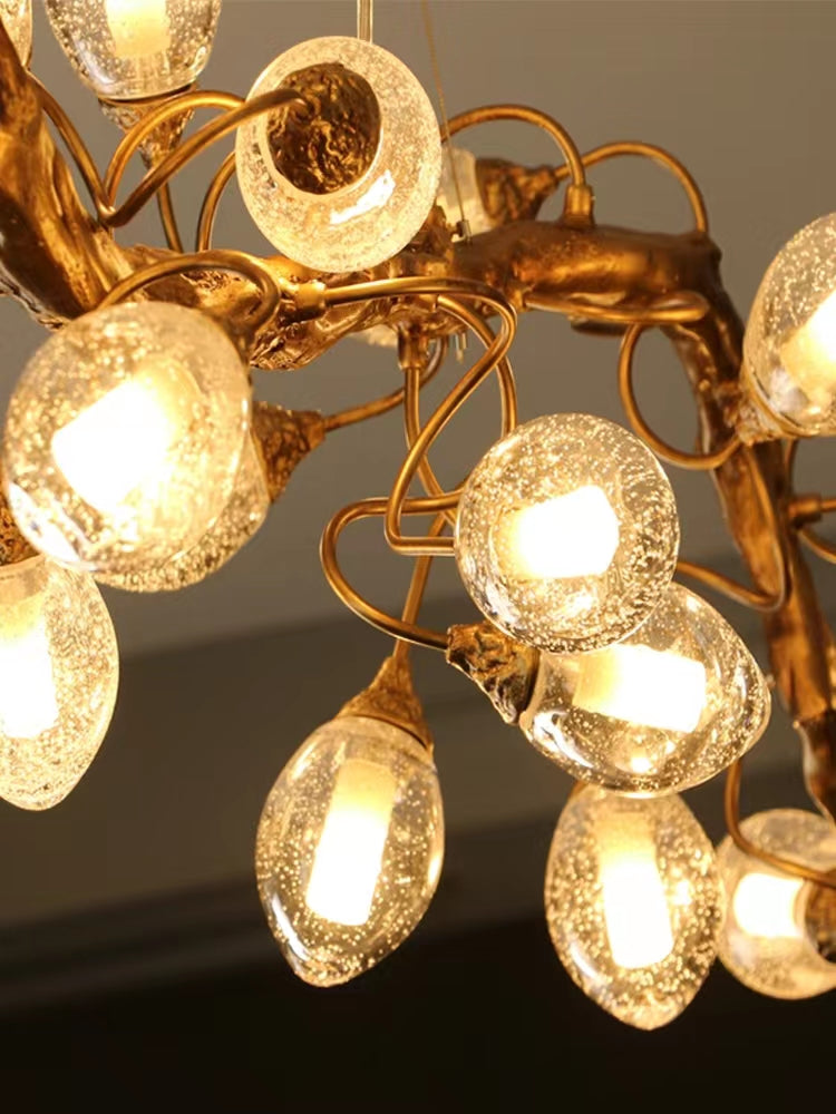 Riviko Veridian Branch LED Chandelier with Clear Seedy Glass - Background Shot