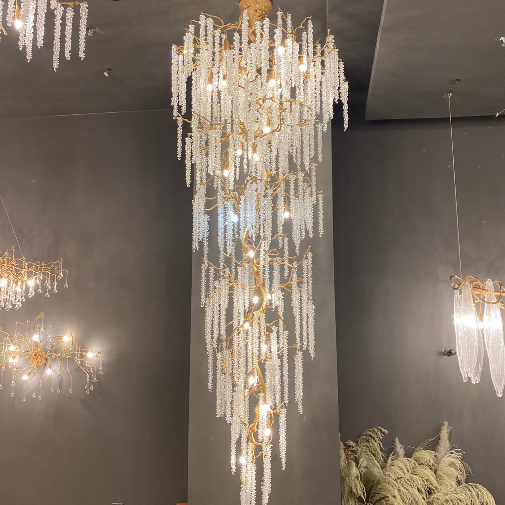 Riviko Celestial Branch Grand Crystal Chandelier - dramatic American stairwell with soaring ceiling
