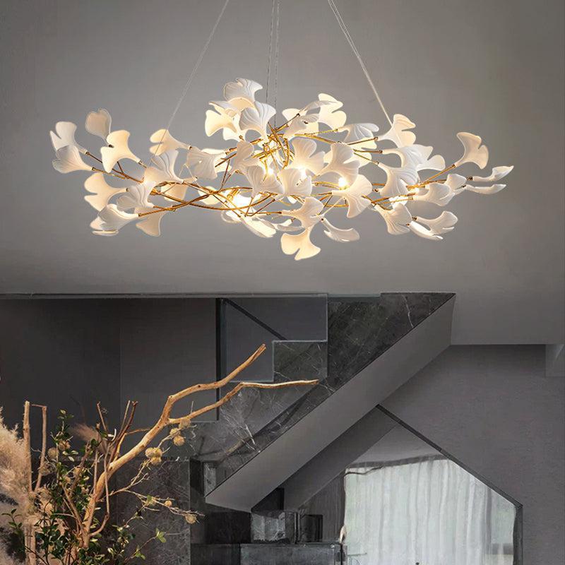 Riviko Ceramic Petal Modern Linear Branch Chandelier - dramatic American stairwell with soaring ceiling