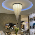 Riviko Opulent Cascade Crystal Tassel Chandelier - American master bedroom with standard ceiling
