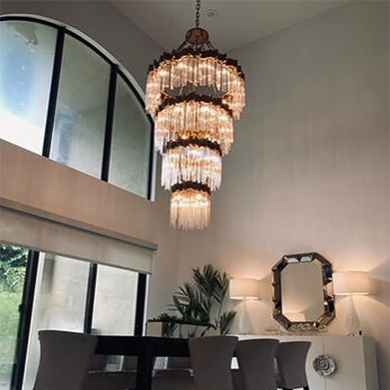 Riviko Grand Radiance Multi-Tiered Round Chandelier - American transitional great room with cathedral ceiling