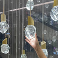 Riviko Grand Lumina Modern K9 Crystal Chandelier - Background Shot
