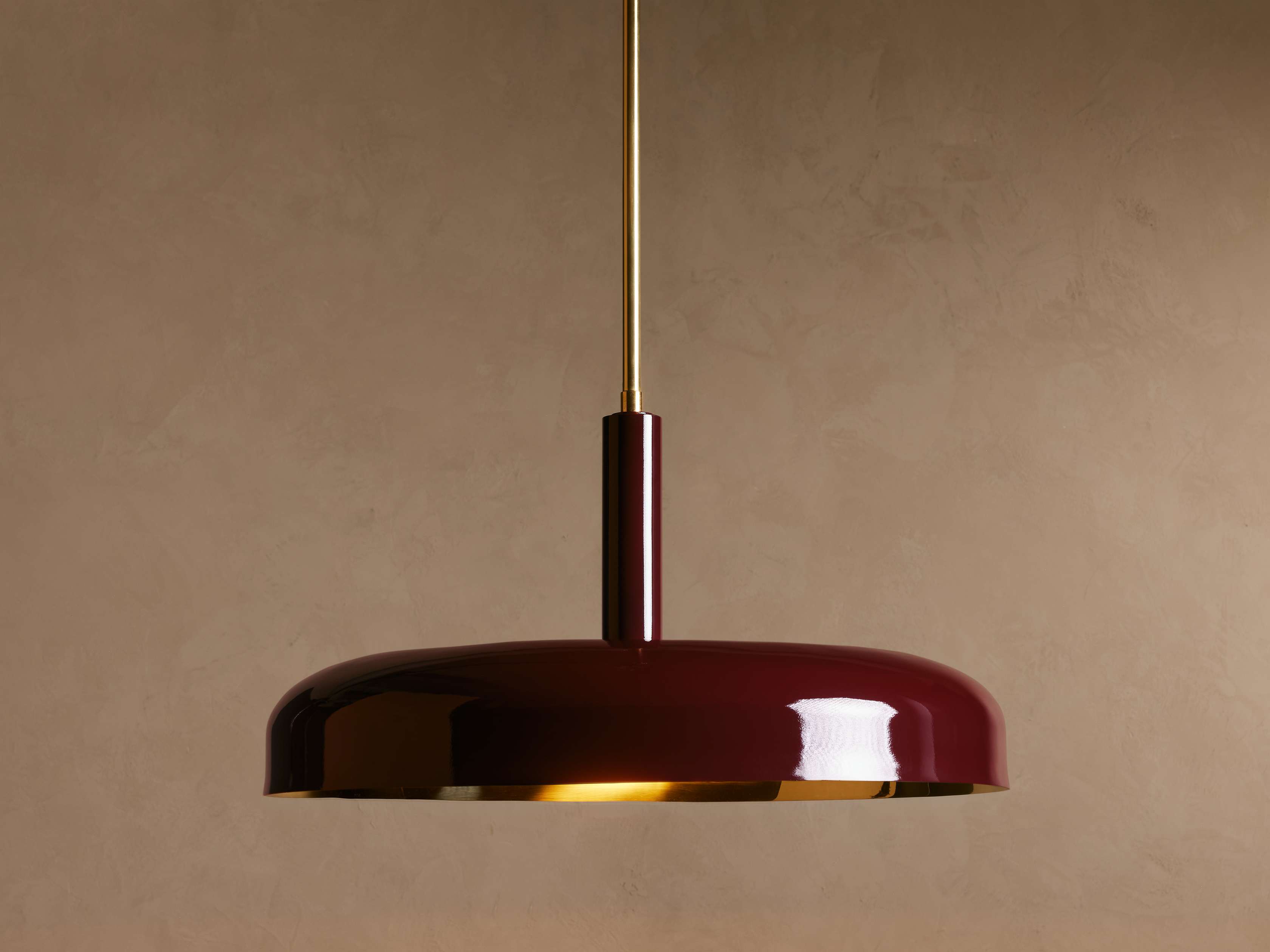 Riviko Aura Grandeur Brass Pendant - dramatic American stairwell with three-story void