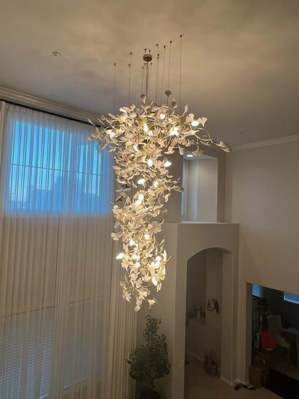 Artistic Tree Branch Pendant Light with Ceramic Ginkgo Leaves for High Ceilings in Hotel or Home - Riviko