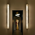 Riviko Alabaster Aura Round Wall Sconce - dramatic American stairwell with soaring ceiling