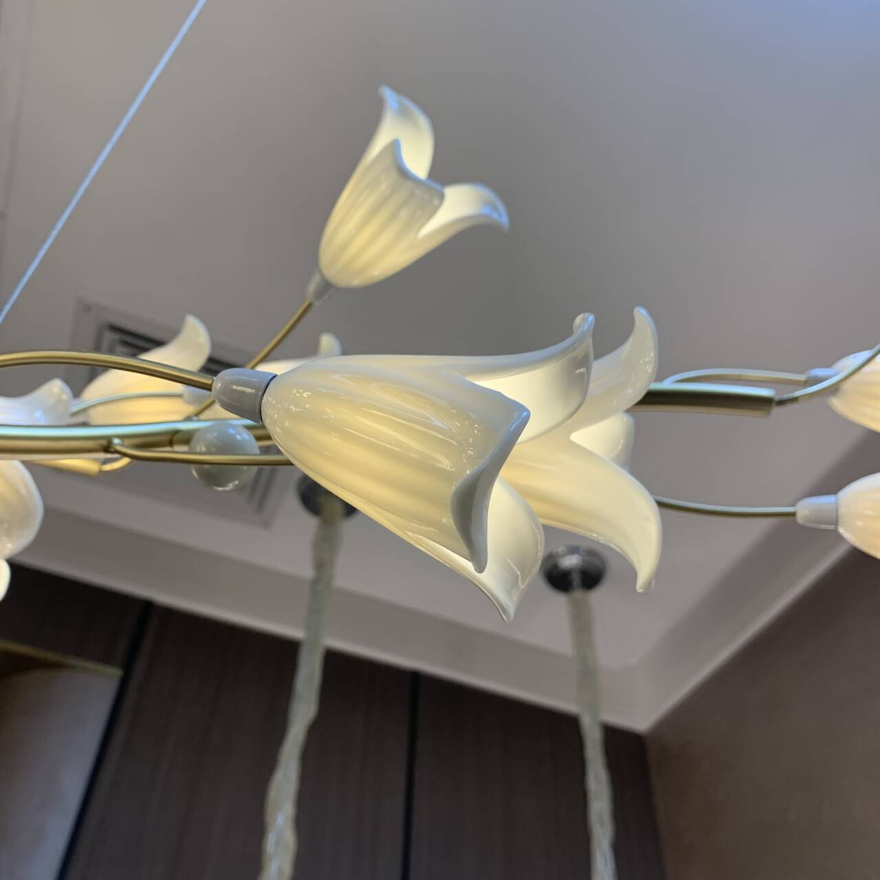 Riviko Botanical Bloom Brass Ceramic Chandelier - Background Shot