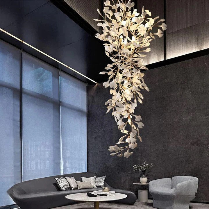 Artistic Tree Branch Pendant Light with Ceramic Ginkgo Leaves for High Ceilings in Hotel or Home - Riviko