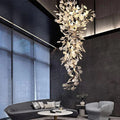 Artistic Tree Branch Pendant Light with Ceramic Ginkgo Leaves for High Ceilings in Hotel or Home