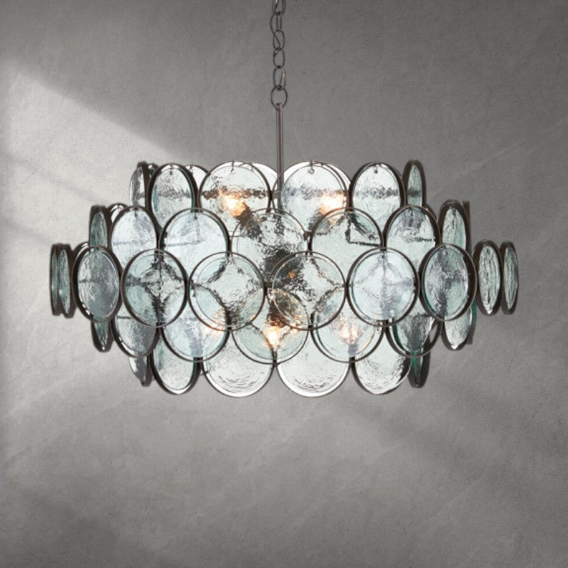 Riviko Radiant Disc 8-Light Chandelier - dramatic American stairwell with soaring ceiling
