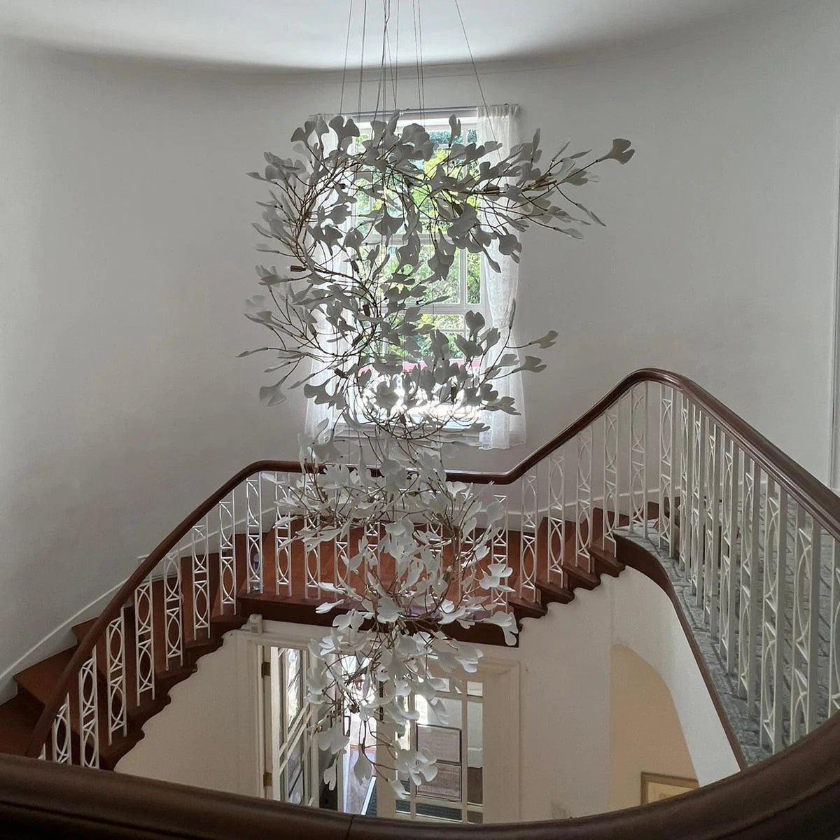 Artistic Tree Branch Pendant Light with Ceramic Ginkgo Leaves for High Ceilings in Hotel or Home - Riviko