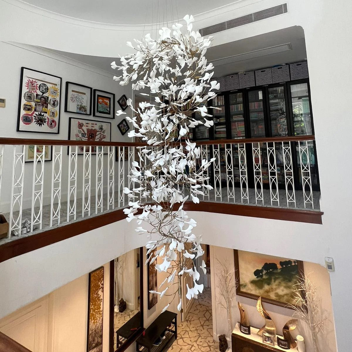 Artistic Tree Branch Pendant Light with Ceramic Ginkgo Leaves for High Ceilings in Hotel or Home - Riviko