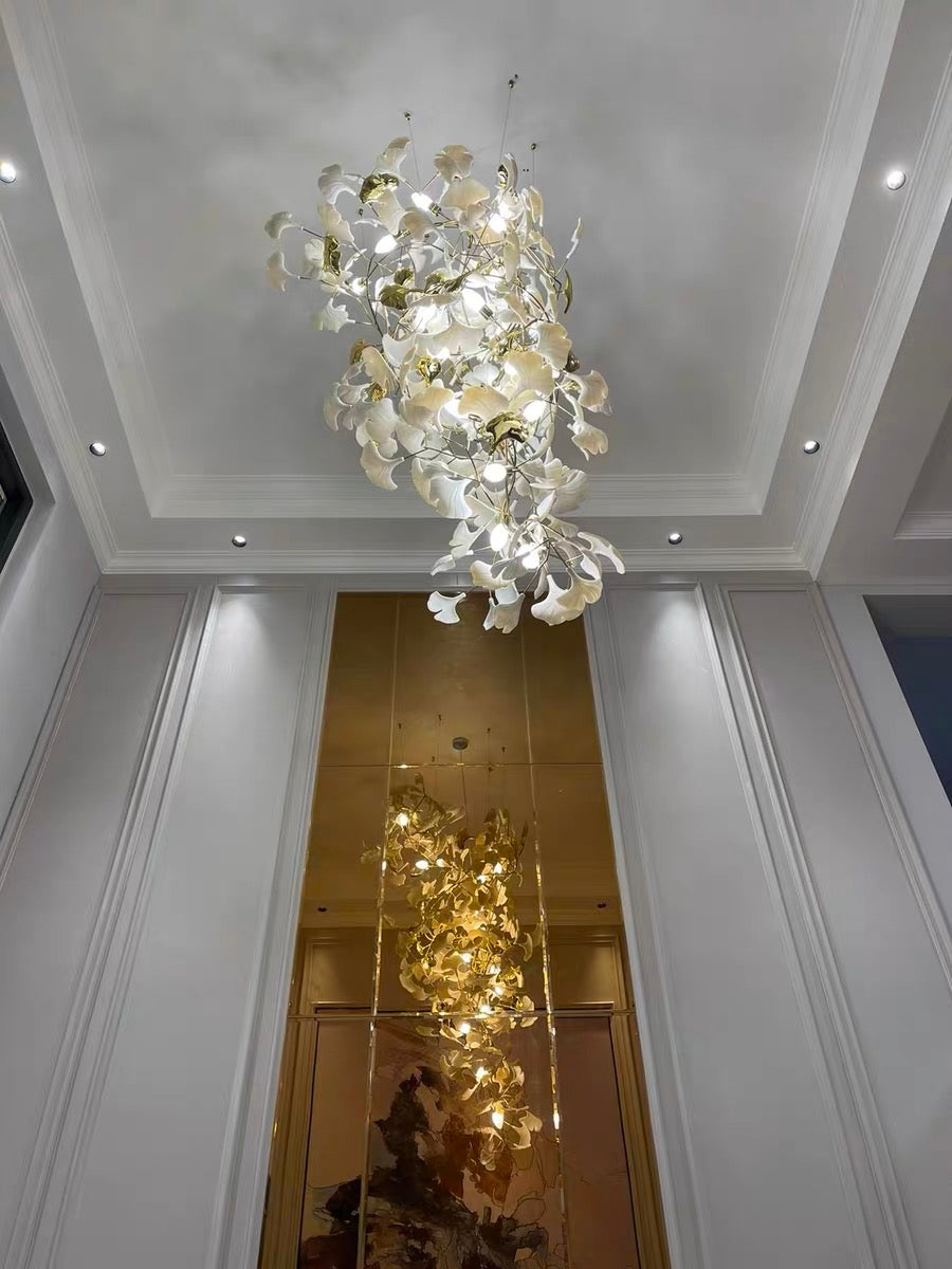 Artistic Tree Branch Pendant Light with Ceramic Ginkgo Leaves for High Ceilings in Hotel or Home - Riviko