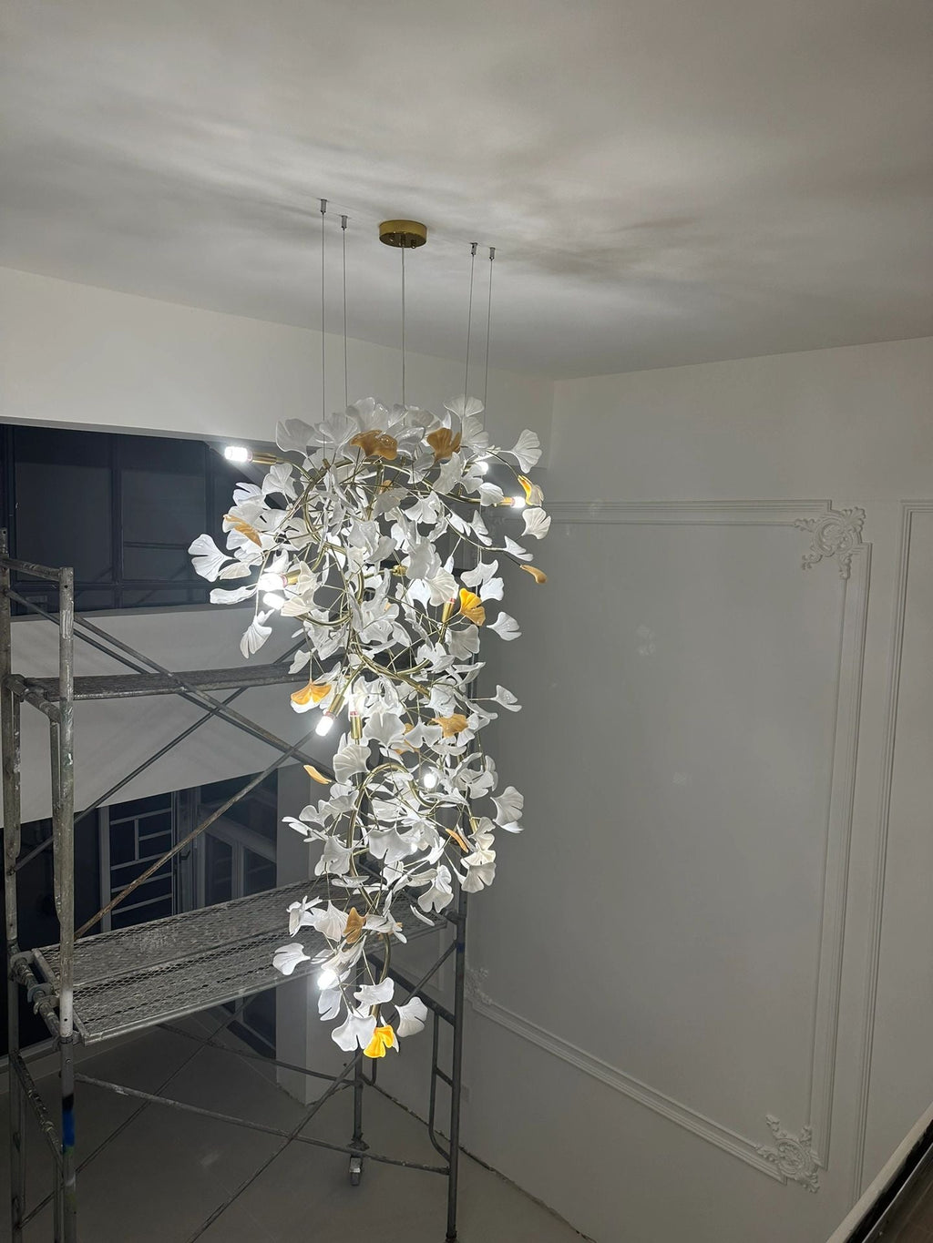 Artistic Tree Branch Pendant Light with Ceramic Ginkgo Leaves for High Ceilings in Hotel or Home - Riviko
