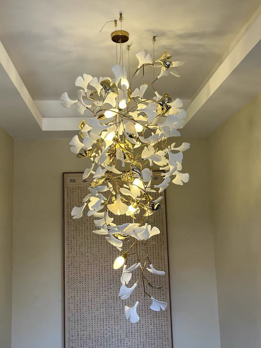 Artistic Tree Branch Pendant Light with Ceramic Ginkgo Leaves for High Ceilings in Hotel or Home - Riviko