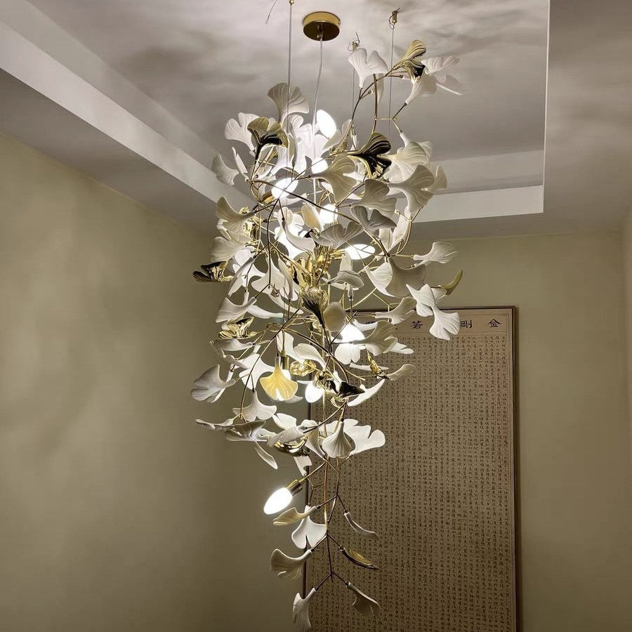Artistic Tree Branch Pendant Light with Ceramic Ginkgo Leaves for High Ceilings in Hotel or Home - Riviko