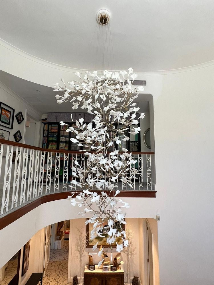 Artistic Tree Branch Pendant Light with Ceramic Ginkgo Leaves for High Ceilings in Hotel or Home - Riviko