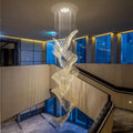 Riviko Grand Lumina Spiral Chandelier - dramatic American stairwell with soaring ceiling