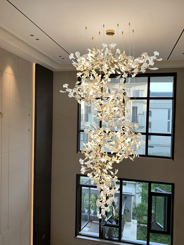 Artistic Tree Branch Pendant Light with Ceramic Ginkgo Leaves for High Ceilings in Hotel or Home - Riviko