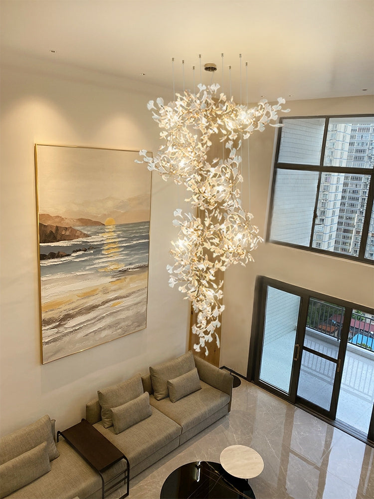 Artistic Tree Branch Pendant Light with Ceramic Ginkgo Leaves for High Ceilings in Hotel or Home - Riviko