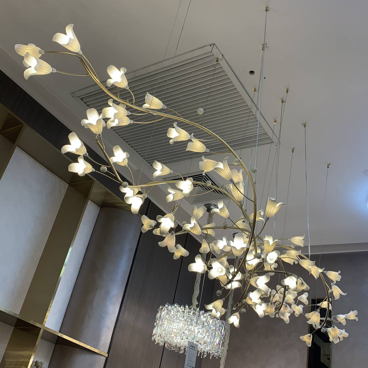 Riviko Botanical Bloom Brass Ceramic Chandelier - American transitional great room with cathedral ceiling