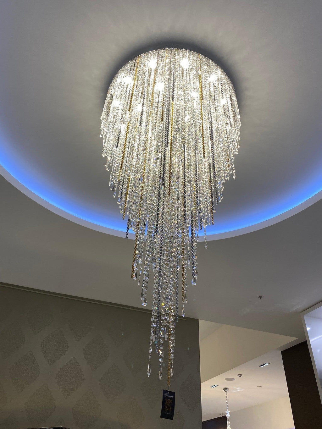 Riviko Opulent Cascade Crystal Tassel Chandelier - Background Shot