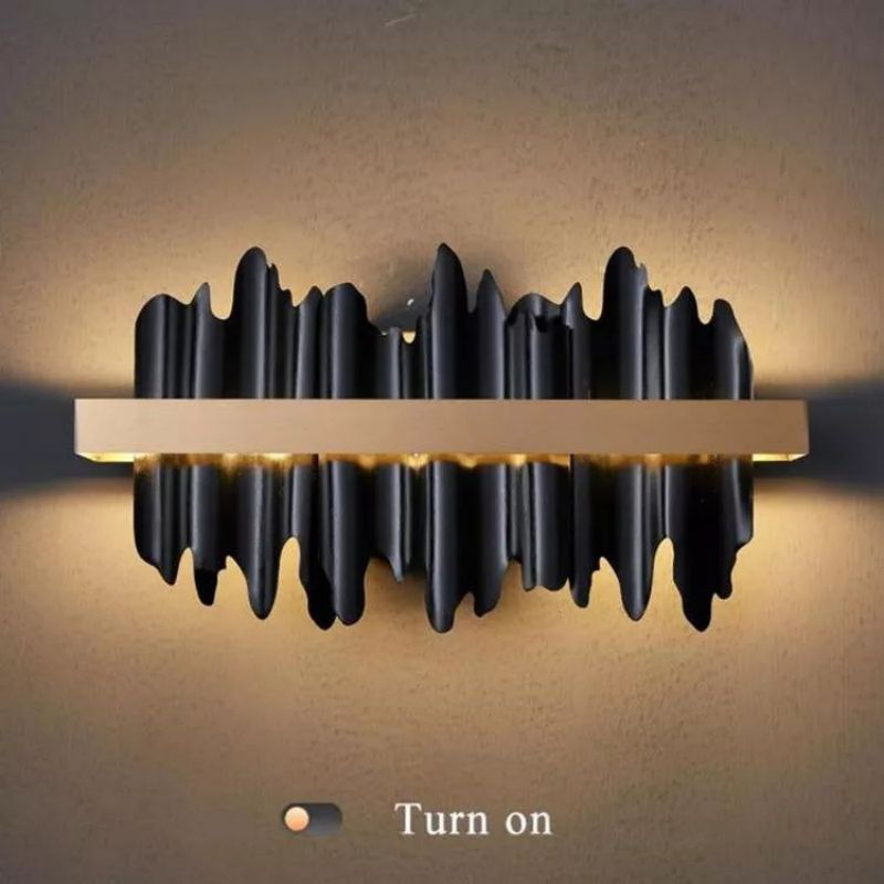 Riviko Sculptural Wave Modern Wall Sconce - Background Shot