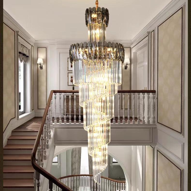Riviko Grand Lumina Spiral K9 Crystal Chandelier - dramatic American stairwell with soaring ceiling