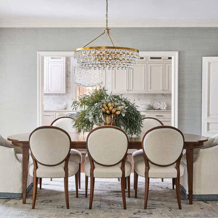 Riviko Regal Radiance 6-Light Grand Chandelier - dramatic American stairwell with soaring ceiling